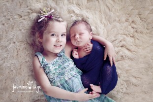 newborn with sibling photos